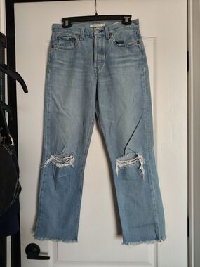 Levi's Light Blue Relaxed Straight Jeans with Knee Rips